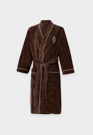 Peignoir en velours marron avec passepoils blancs, deux poches à l'avant, une ceinture à la taille et un logo en forme de losange sur la poitrine.