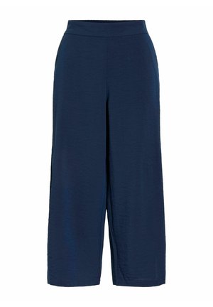 Tumesinised laia lõikega lühikesed püksid kõrge vöökohaga ja siledast kangast, valgel taustal.