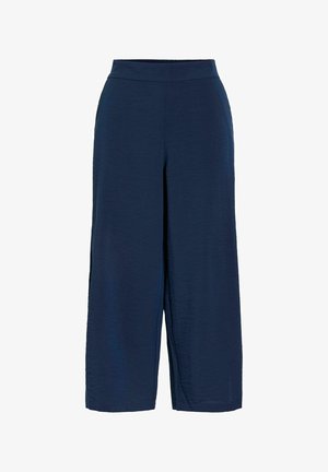 Tumesinised laia lõikega lühikesed püksid kõrge vöökohaga ja siledast kangast, valgel taustal.