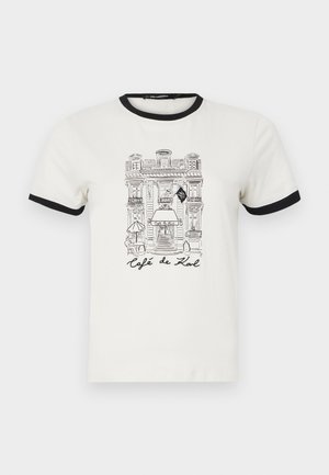 Balta medvilninė marškinėliai su juodu ribotu apykakle ir rankovėmis. Pavaizduota kavinės pastato eskizas ir juodu tekstu "Café de Kal".