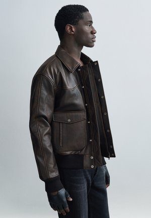 Bunda z nepravej kože - dark brown