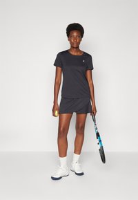 Fila LEONIE - Športne majice - black