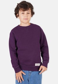 Lila sweatshirt med rund halsringning, ribbad mudd och nederkant. L�ätt tyg med en strukturerad look. Varumärkesetikett sydd i nederkant.