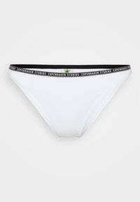 Hvit bikini-bunn med en svart merket midjebånd med "Copenhagen Studios"-bokstaver. Glatt, elastisk materiale med klassisk snitt.