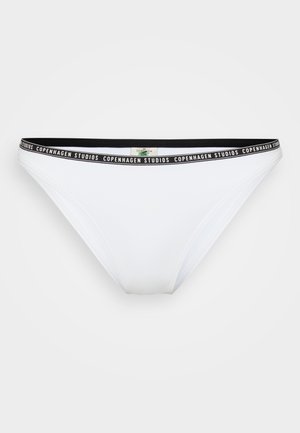 Bas de bikini blanc avec une taille élastique noire portant l'inscription "Copenhagen Studios". Matière lisse et extensible avec une coupe classique.