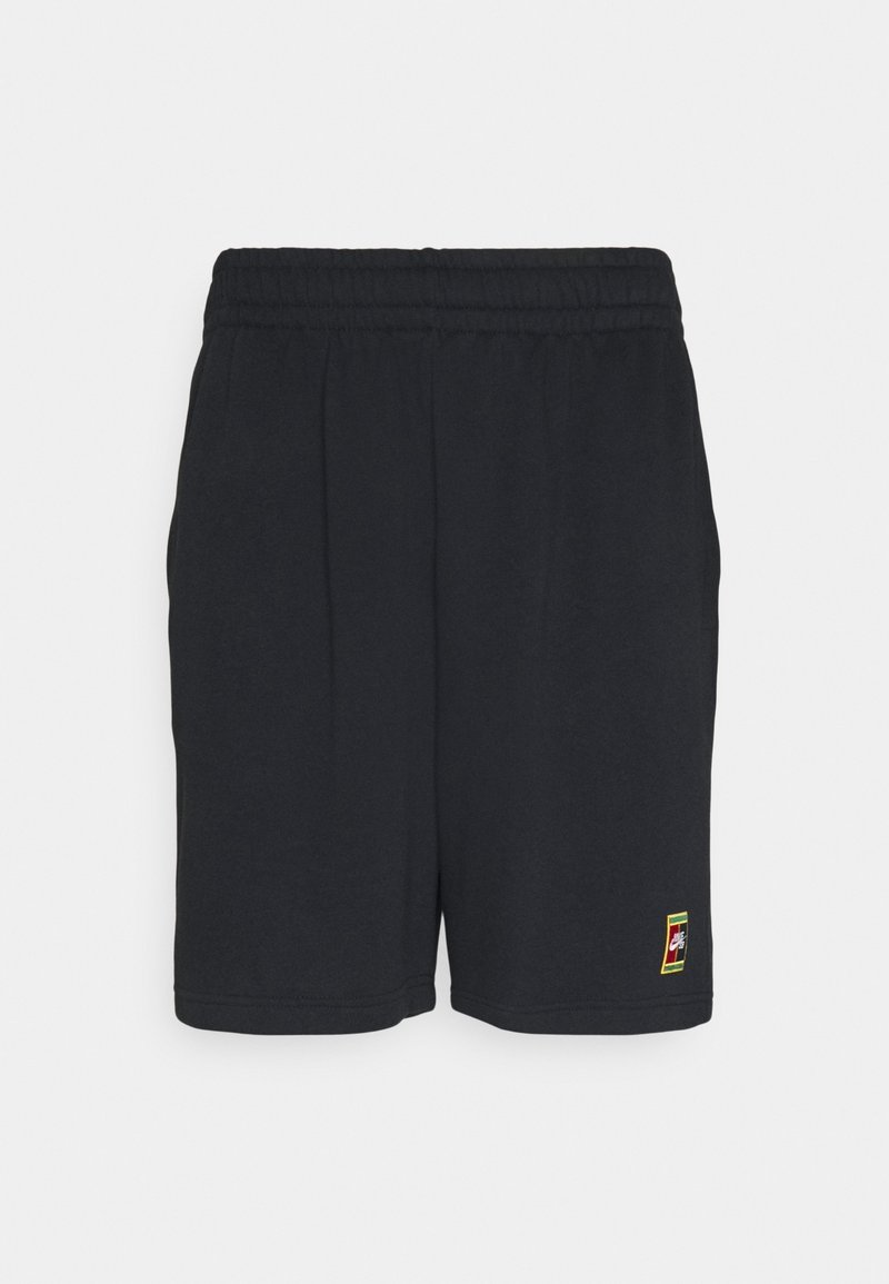 Shorts en coton noirs avec une taille élastique, dotés de poches latérales et d'un petit logo multicolore en bas à gauche. Texture lisse.