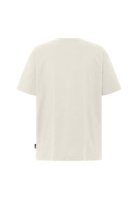 T-shirt a maniche corte color beige chiaro, realizzato in morbido cotone. Presenta un collo a giro classico e una vestibilità leggermente rilassata. Nessun disegno o grafica visibili.