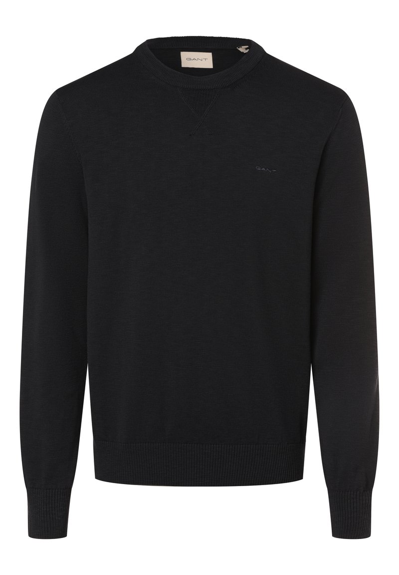 Schwarzer Pullover aus Strickstoff. Hat einen Rundhalsausschnitt, lange Ärmel und gerippte Bündchen sowie Saum. Kleines Logo auf der Brust.