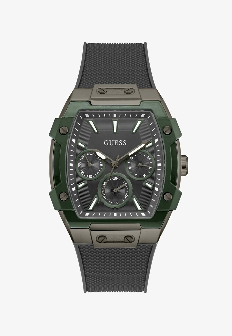 Montre verte et noire en forme hexagonale, avec un bracelet en caoutchouc noir texturé, trois sous-cadrans et des index horaires proéminents. Détails en métal.