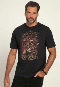 Camiseta de algodón negra con un esqueleto tocando la guitarra, con elementos gráficos en rojo y beige y el texto "Rock 'N' Roll está en mi alma."
