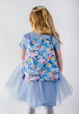 Drawstring backpack in lightweight, colorful fabric featuring abstract patterns of clouds, stars, and planets. Purple straps and elastic top.
