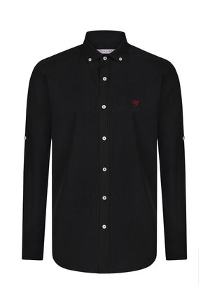 Schwarzes Langarmhemd mit Button-Down-Kragen, Frontblende mit weißen Knöpfen und kleinem roten Vogel-Logo auf der linken Brust.