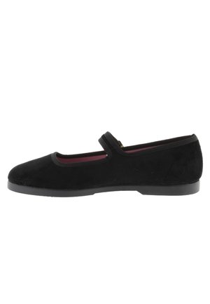 Black suede Mary Jane shoe with a flat rubber sole, round toe, and a velcro strap across the instep. Features a smooth texture and sleek design.