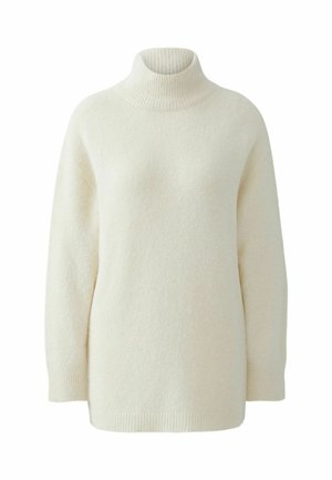 Romantische turtleneck trui gemaakt van zachte breiwijze stof. Heeft lange mouwen, een ontspannen pasvorm en ribgebreide kraag en manchetten voor een extra textuur.
