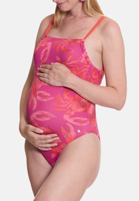 Schwimmanzug für Schwangere in Pink mit Blumenmuster in Orangetönen. Verfügt über dünne Träger und ein Rüschendesign, geeignet für werdende Mütter.