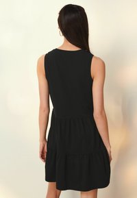 Next SLEEVLESS REGULAR FIT - Trikoomekko - black