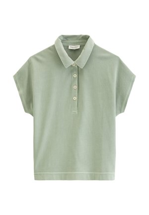 Polo à manches courtes vert clair avec quatre boutons et un col, fabriqué en tissu texturé doux, posé à plat sur un fond blanc.