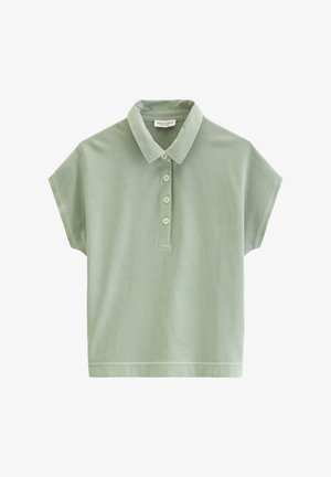 Light green short-sleeve polo shirt with four buttons and a collar, made from soft textured fabric, laid flat against a white background.
