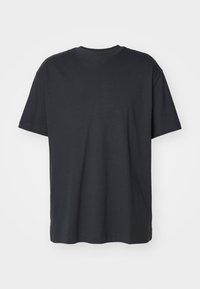 Schwarzes Kurzarm-T-Shirt aus glattem Baumwollstoff. Verfügt über einen Rundhalsausschnitt und eine lockere Passform, ohne sichtbare Logos oder Muster.