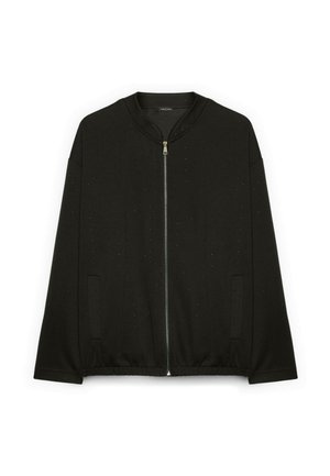 Czarna kurtka na zamek z długim rękawem, z małym, subtelnym wzorem w kropki, bocznymi kieszeniami, elastycznym obszyciem i okrągłym kołnierzem.