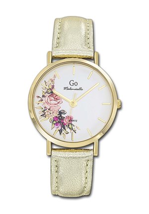 Montre-bracelet en or avec un motif floral sur le cadran blanc, des index et aiguilles dorés, et un bracelet en cuir doré clair.