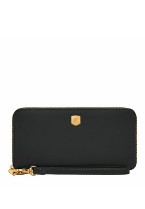 Black leather wallet with gold zipper and hardware. Features a logo emblem and wrist strap, showcasing a sleek rectangular design.