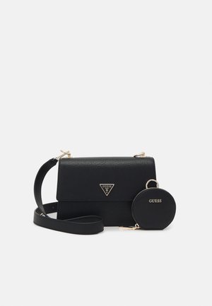 Black textured leather crossbody bag with gold-tone logo triangle and matching round coin purse with zipper.