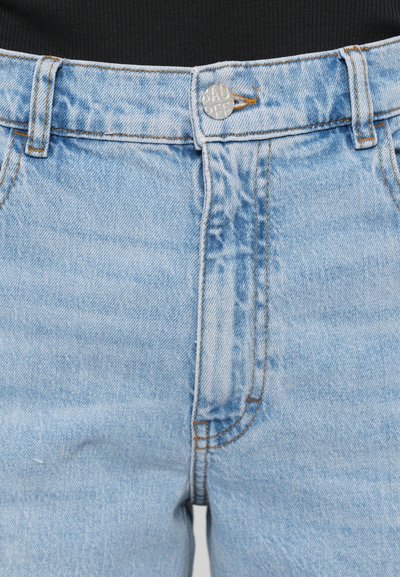 Light blue denim jeans with a high waist, featuring a metal button closure, contrasting stitching, and a smooth texture.