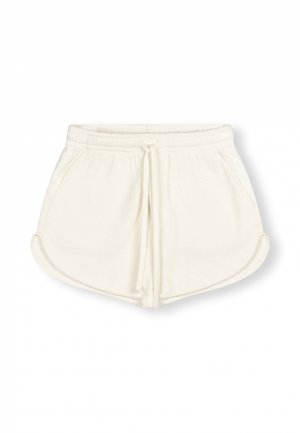 Shorts in pile bianco con cintura elastica, cordoncino regolabile e tasche laterali. Orlo curvo con tessuto testurizzato.