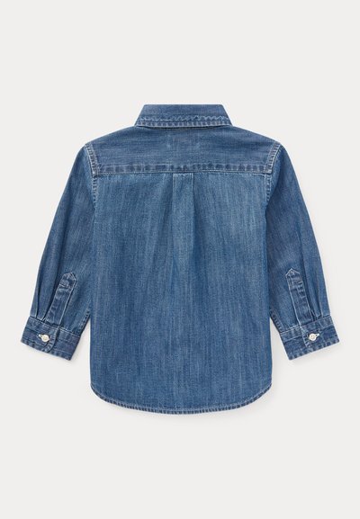 Tumesinine denimsärk, millel on terav krae, pikad varrukad nupuga mansettidega ja selja lõhk, mis lisab disainile detaili.