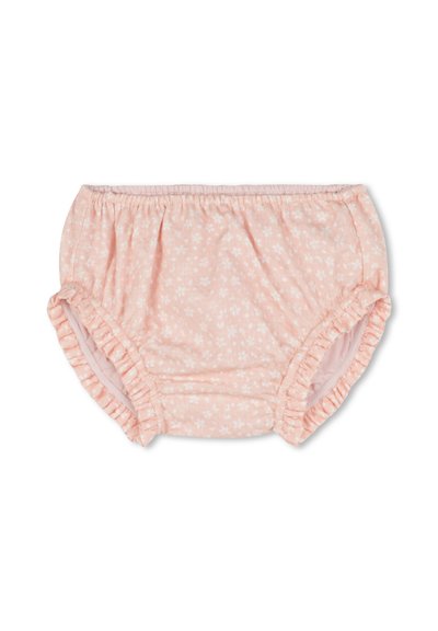 Culottes en coton rose clair avec imprimé floral blanc, dotées d'une taille élastique et de bordures froncées pour un détail supplémentaire.