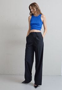 Iro ISALINE - Pantalon classique - black