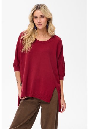 - Sweter