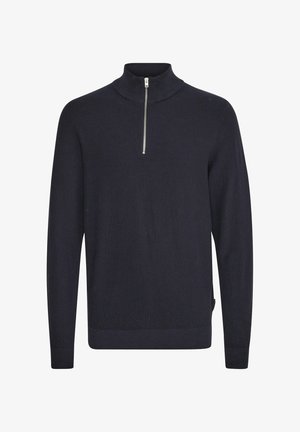 Navy blue knit pullover with a high collar and a short silver zipper. Ribbed texture at cuffs and hem. Casual fit.