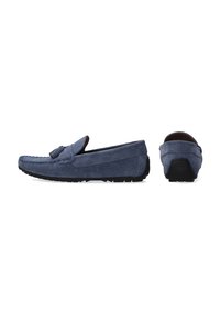 Mørkeblå ruskindsloafers med en mokkasindesign, syet detaljer og en gummisål. Har en frynseaccent foran.