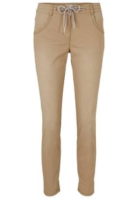 Pantalons beige clair au coupe ajustée, avec une taille élastique à cordon de serrage, deux poches avant et des détails de couture subtils. Tissu au toucher lisse.