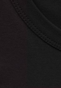Black pullover fabric featuring a ribbed neckline and a smooth texture, showing slight color variation in two shades of black.