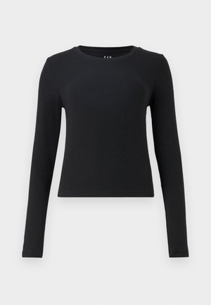 Črna majica z dolgimi rokavi, okrogla izreza, rebrasta tekstura, prilegajoč dizajn in skrajšana dolžina. Brez vzorcev ali vidnih kovinskih podrobnosti.