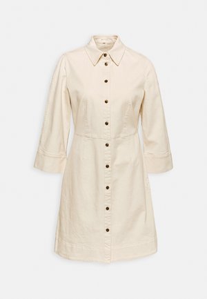 Kleid mit kurzen Ärmeln und Knopfleiste aus hellbeigem Baumwollstoff. Verfügt über einen Kragen, braune Knöpfe und eine gerade Silhouette. Strukturierter, lässiger Look.