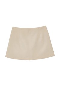 Mini gonna beige con orlo dritto e dettagli di cucitura minimi, stesa su uno sfondo bianco.