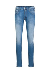 Skinny-fit jeans in lichtblauwe denim. Vervaagde wassing, vijf-pocket ontwerp met zichtbare stiksels, metalen knoop en ritsopening.
