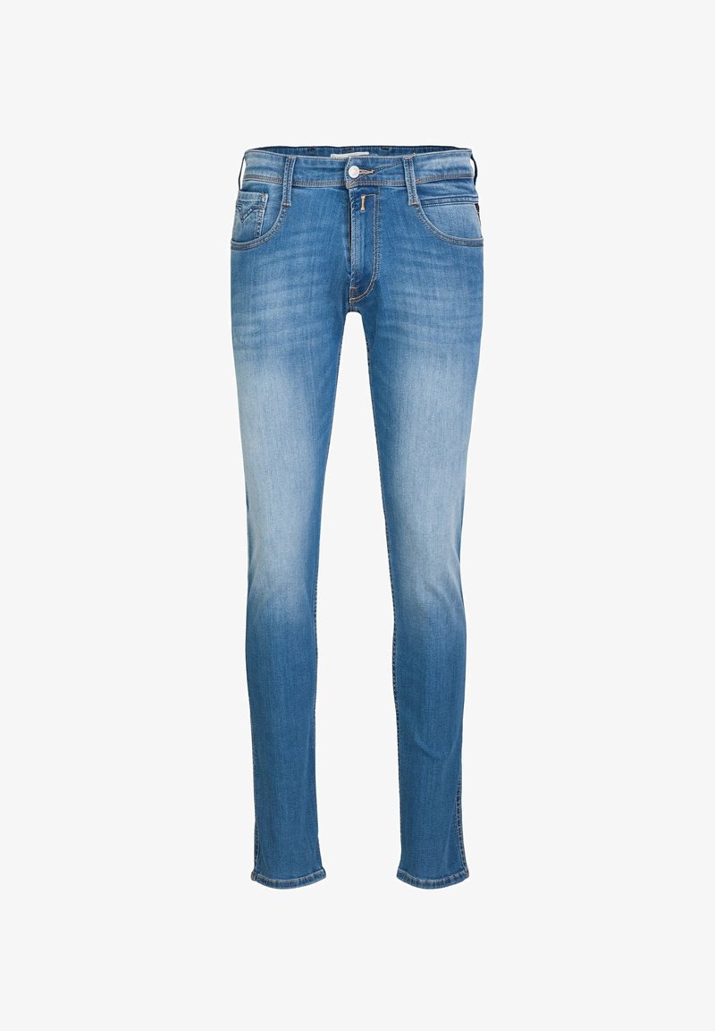 Skinny-fit jeans in lichtblauwe denim. Vervaagde wassing, vijf-pocket ontwerp met zichtbare stiksels, metalen knoop en ritsopening.