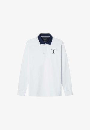 Langærmet polo skjorte i hvid bomuld med en navy krave. Har et logo med "HACKETT" og "1 LONDON" trykt på brystet.