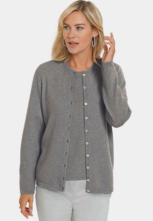 Grijze cardigan met lange mouwen, ronde hals, knoopsluiting, geribde manchetten en zoom. Gemaakt van zachte stof met een subtiele textuur.