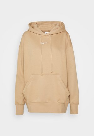 Felpa beige realizzata in tessuto morbido, con tasca a marsupio, cordini e logo Nike bianco centrato sul petto.
