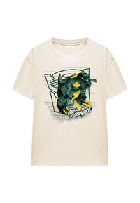 Cream-colored t-shirt featuring a graphic of a green and yellow robot dinosaur, with stylized text in black at the bottom and a textured background.