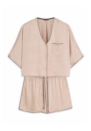 Bluzka z krótkim rękawem i dekoltem w serek w jasnobeżowym satynie, z kieszonką i ciemnym akcentującym obszyciem. Posiada elastyczny pas dla luźnego dopasowania.