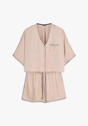 Bluzka z krótkim rękawem i dekoltem w serek w jasnobeżowym satynie, z kieszonką i ciemnym akcentującym obszyciem. Posiada elastyczny pas dla luźnego dopasowania.