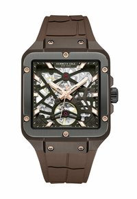 Vierkante automatische horloge met een bruine siliconen band, een zwart en zilveren skelet-dial, rosegouden accenten en mineraalglas.