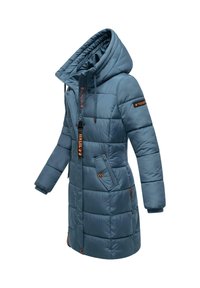 Padded coat in muted blue, featuring a high collar, zip closure, side pockets, and elastic cuffs; orange accents and branding details.
